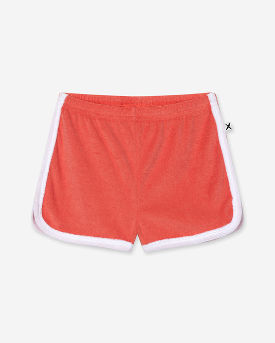 Track Star Short in tangerine, girls shorts by Minti, flat lay
