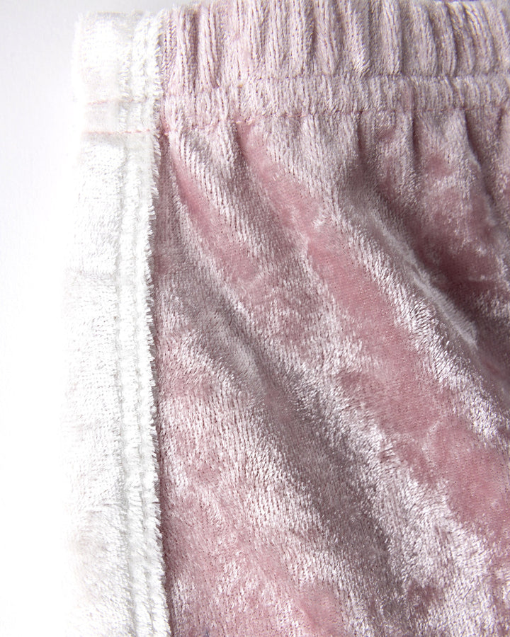 Close up detail of the Velvet Runner Short in blush and cream
