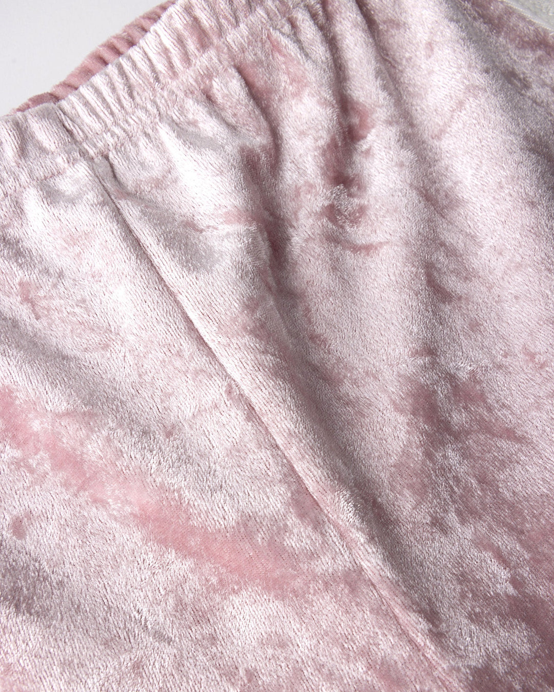 Close up detail of the Velvet Runner Short in blush and cream