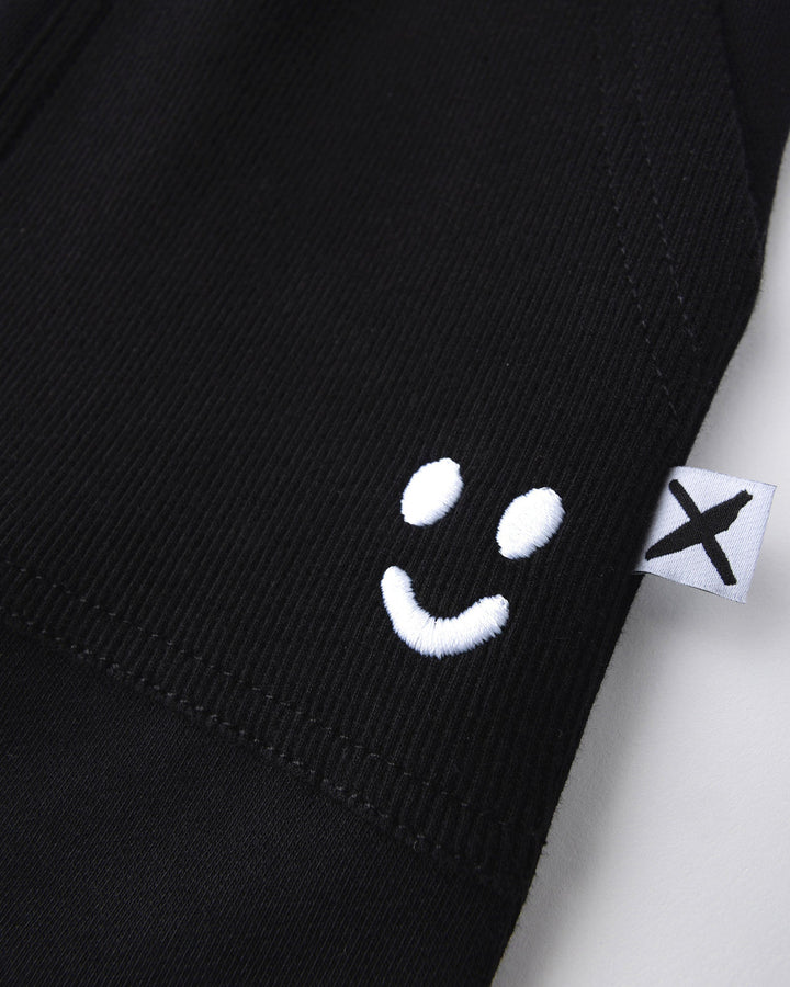 Close up detail of the Rib Pocket Short in black