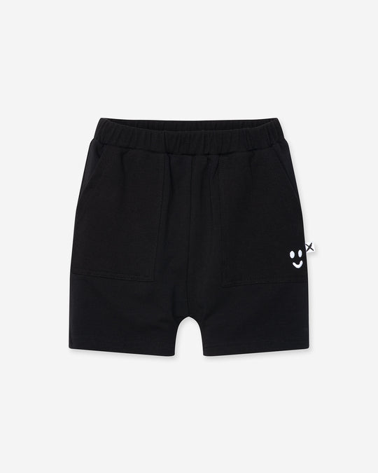 Rib Pocket Short in black, boys shorts by Minti, flat lay