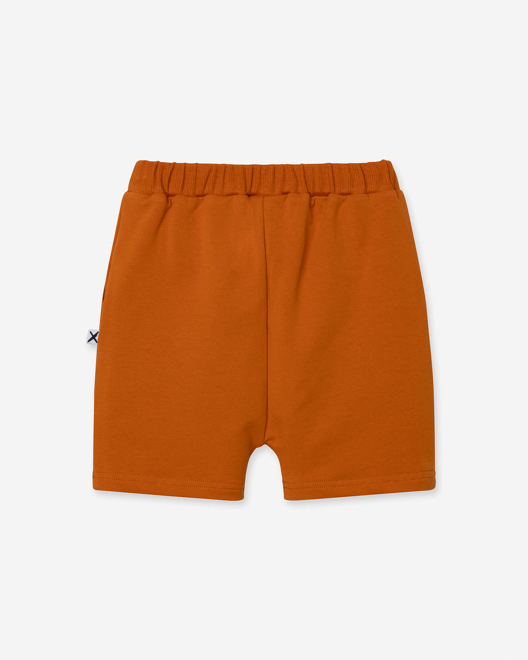 Rib Pocket Short in burnt orange, boys shorts by Minti, flat lay