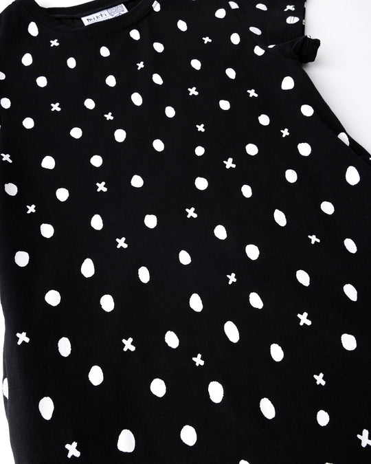 Close up of the Spotty Dress print in black