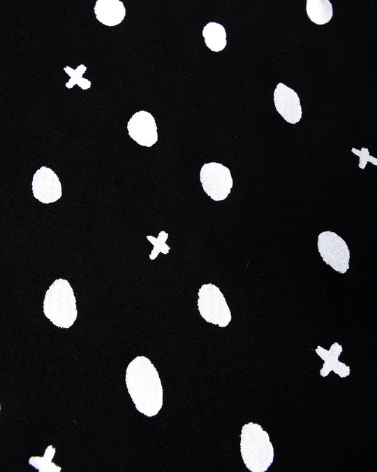 Close up of the Spotty Dress print in black