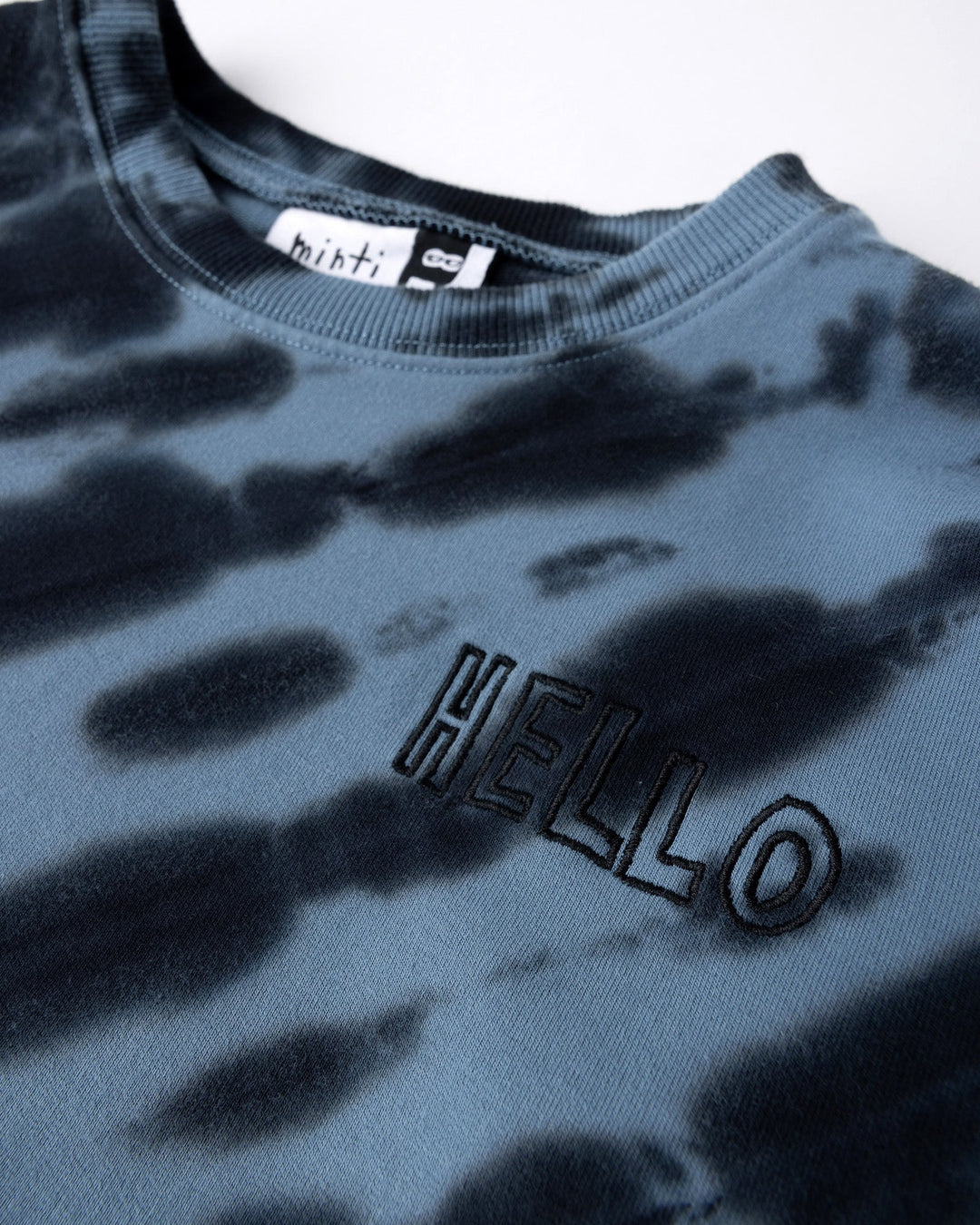 Close up detail of the Duo Tie Dye Crew in blue and aqua