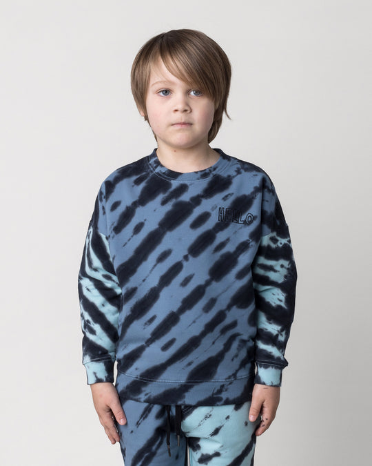 Close up of the Duo Tie Dye Crew in blue and aqua on a kid, front view