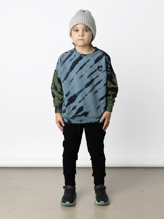 Minti kids clothing. Super cosy oversized fit crew with drop shoulder detail. 2x2 Rib at the neck, hem and cuffs. 320 Gram // 95% Cotton // 5% Elastane.
