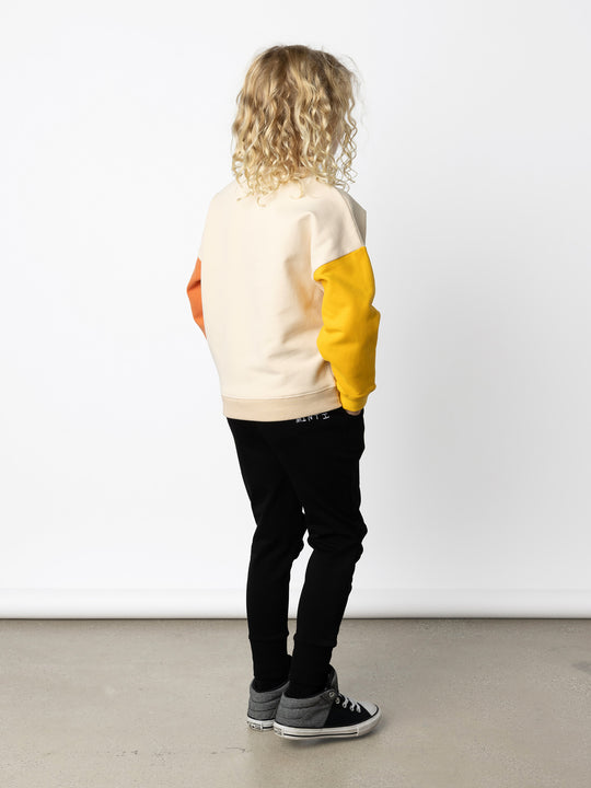 Minti kids clothing. Super cosy oversized fit crew with drop shoulder detail. 2x2 Rib at the neck, hem and cuffs. 330 Gram // Brushed Inside // 95% Cotton // 5% Elastane.