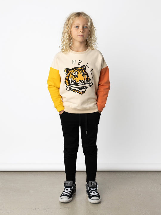Minti kids clothing. Super cosy oversized fit crew with drop shoulder detail. 2x2 Rib at the neck, hem and cuffs. 330 Gram // Brushed Inside // 95% Cotton // 5% Elastane.