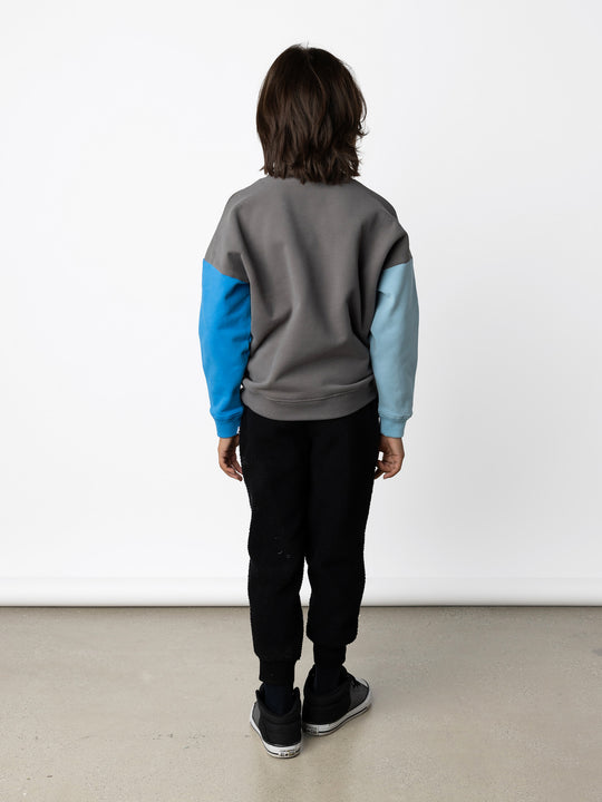 Minti kids clothing. Super cosy oversized fit crew with drop shoulder detail. 2x2 Rib at the neck, hem and cuffs. 330 Gram // Brushed Inside // 95% Cotton // 5% Elastane.