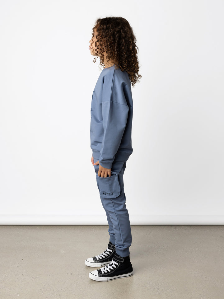 Minti kids clothing. Super cosy oversized fit crew with drop shoulder detail. 2x2 Rib at the neck, hem and cuffs. 320 Gram // 95% Cotton // 5% Elastane.
