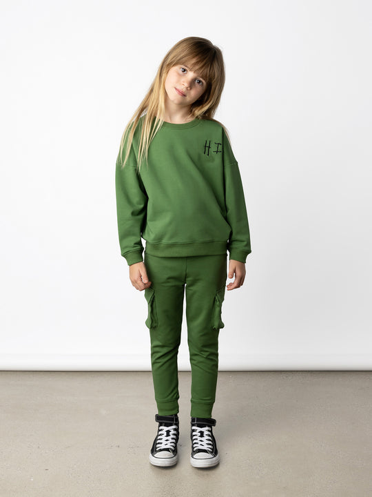 Minti kids clothing. Super cosy oversized universal fit crew with drop shoulder detail. 2x2 Rib at the neck, hem and cuffs. 320 Gram // 95% Cotton // 5% Elastane.