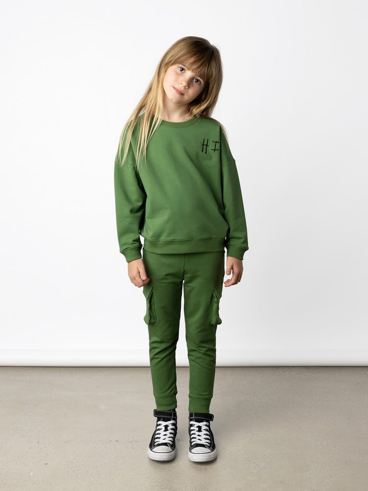 Minti kids clothing. Super cosy oversized universal fit crew with drop shoulder detail. 2x2 Rib at the neck, hem and cuffs. 320 Gram // 95% Cotton // 5% Elastane.