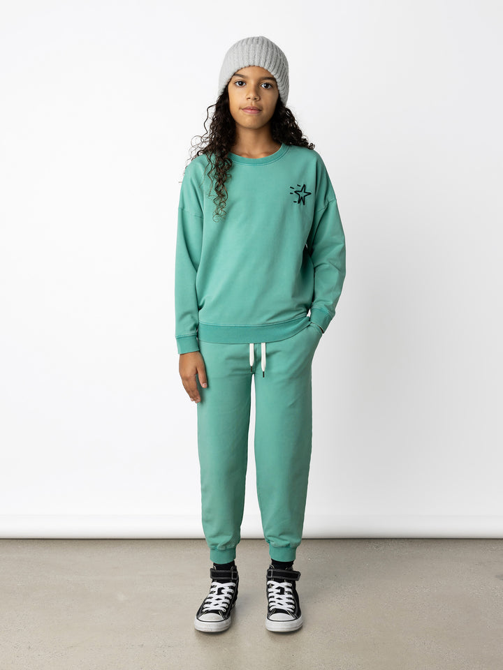 Minti kids clothing. Super cosy oversized fit crew with drop shoulder detail. 2x2 Rib at the neck, hem and cuffs. 260 Gram // 95% Cotton // 5% Elastane.