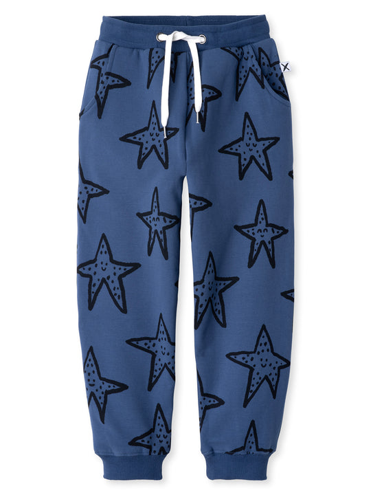 Minti kids clothing. Relaxed fit trackies with cosy side pockets, elasticated waistband, shoelace cord and 2x2 Rib cuffs. 330 Gram // Brushed Inside // 95% Cotton // 5% Elastane.