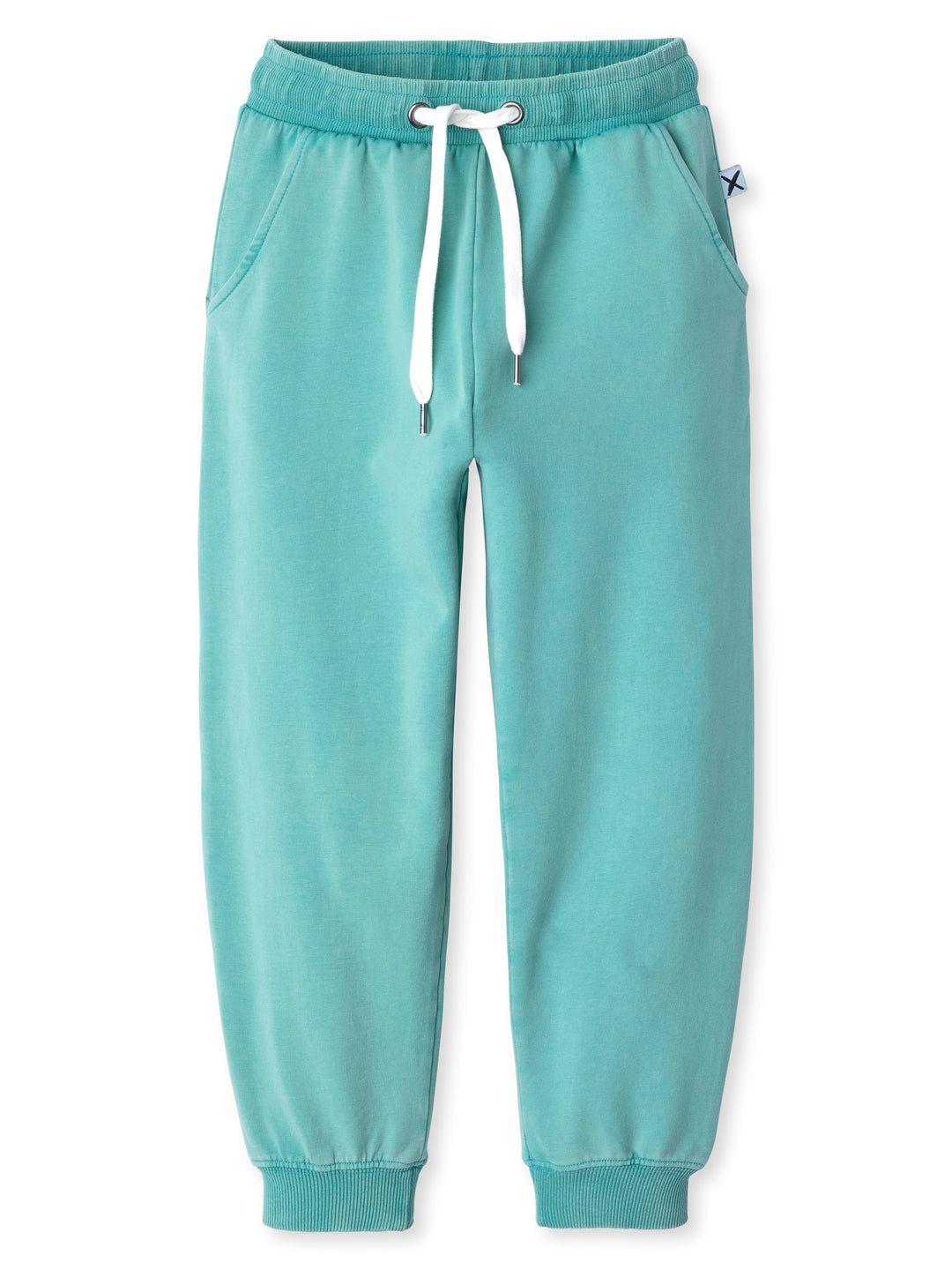 Minti kids clothing. Relaxed universal fit trackies with cosy side pockets, elasticated waistband, shoelace cord and 2x2 Rib cuffs. Small Minti embroidery on the back. 260 Gram // 95% Cotton // 5% Elastane.