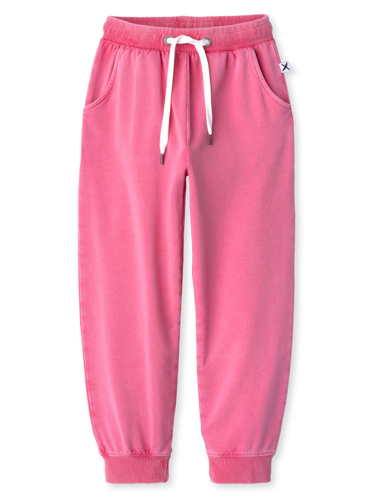 Minti kids clothing. Relaxed universal fit trackies with cosy side pockets, elasticated waistband, shoelace cord and 2x2 Rib cuffs. Small Minti embroidery on the back. 260 Gram // 95% Cotton // 5% Elastane.