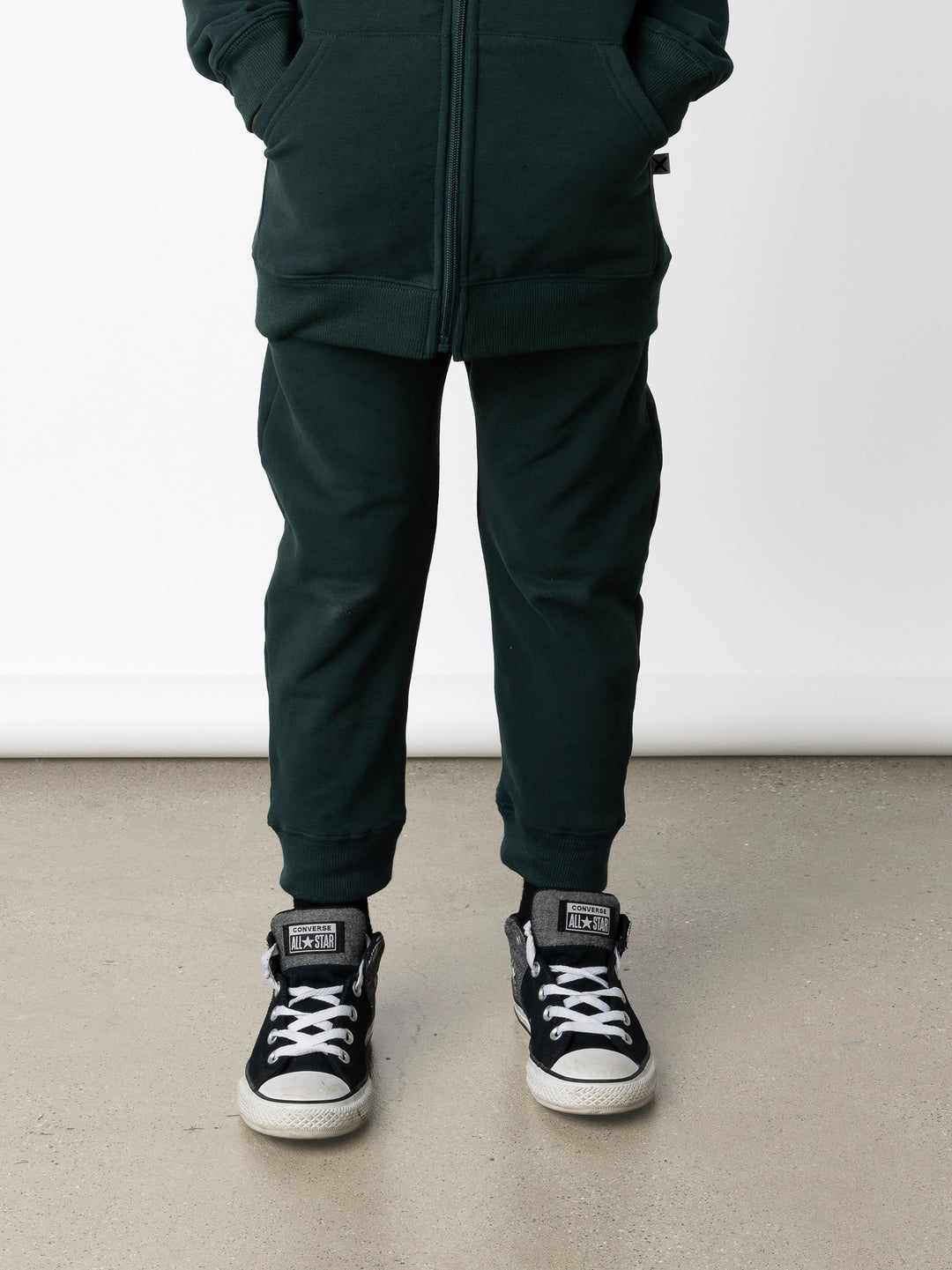 Minti kids clothing. Super cool baggy trackies with elastic waistband, front pockets, back pocket and 2x2 rib cuffs. 330 Gram // Brushed Inside // 95% Cotton // 5% Elastane.