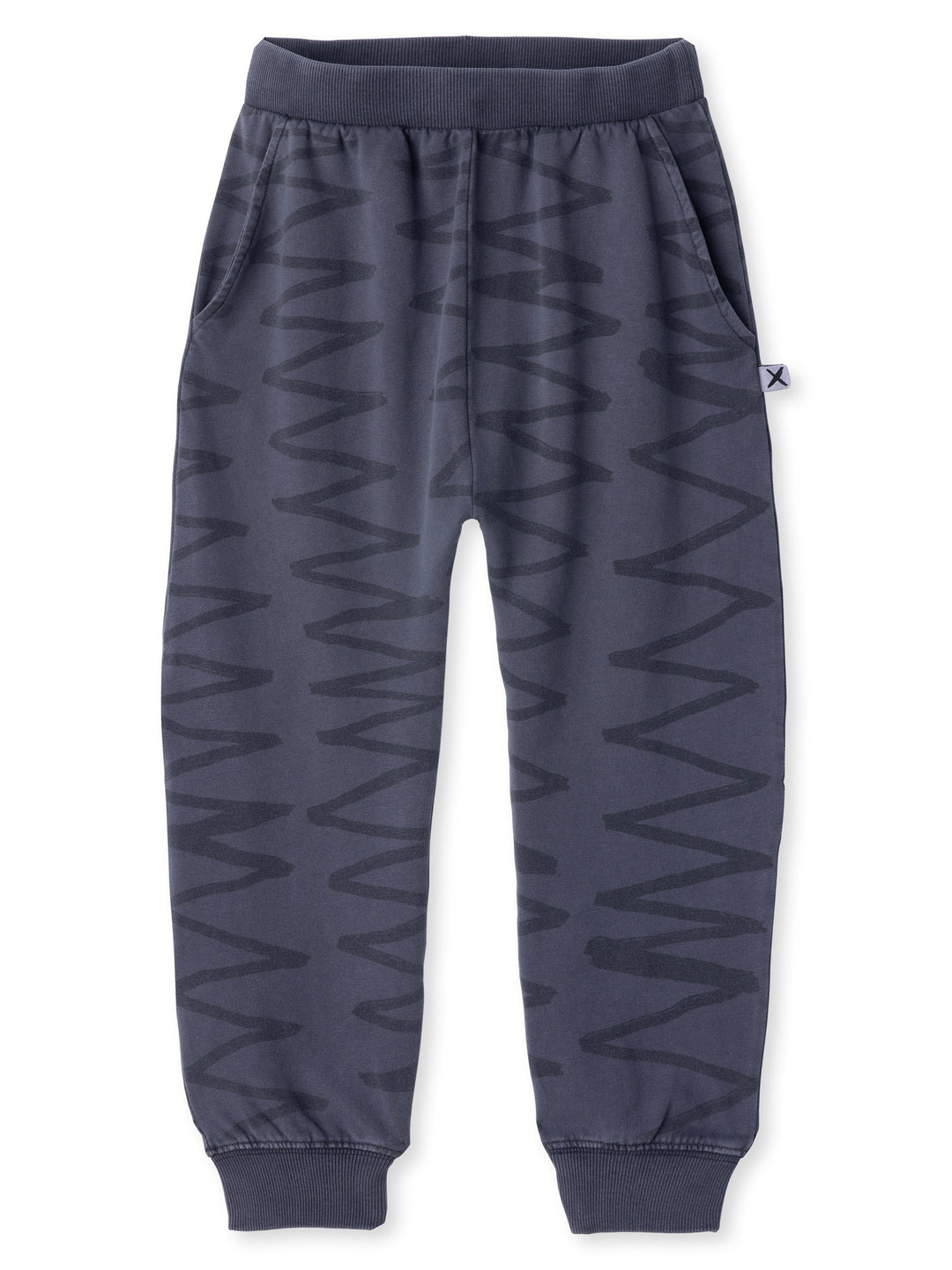 Minti kids clothing. Super cool baggy trackies with elastic waistband, front pockets, back pocket and 2x2 rib cuffs. 260 Gram // 95% Cotton // 5% Elastane.