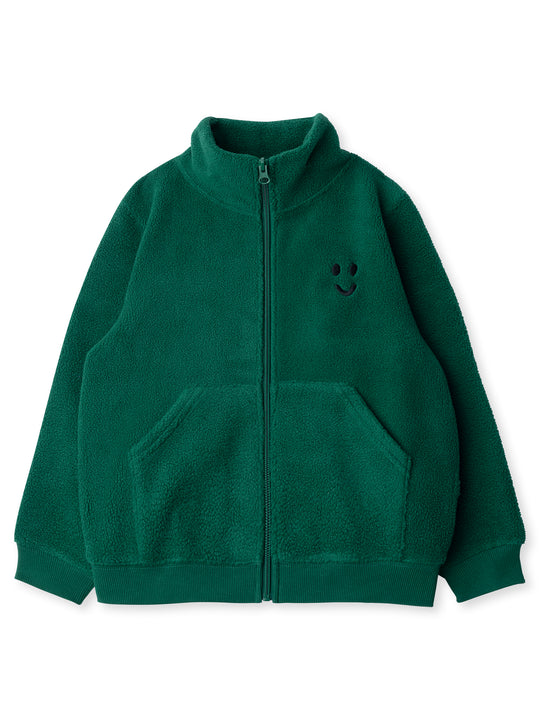 Minti kids clothing. Super cosy and soft zip up high neck crew, made in Teddy fabric with 2x2 Rib cuffs and hem. Front kangaroo pocket to keep hands warm. 70% Polyester // 30% Cotton.