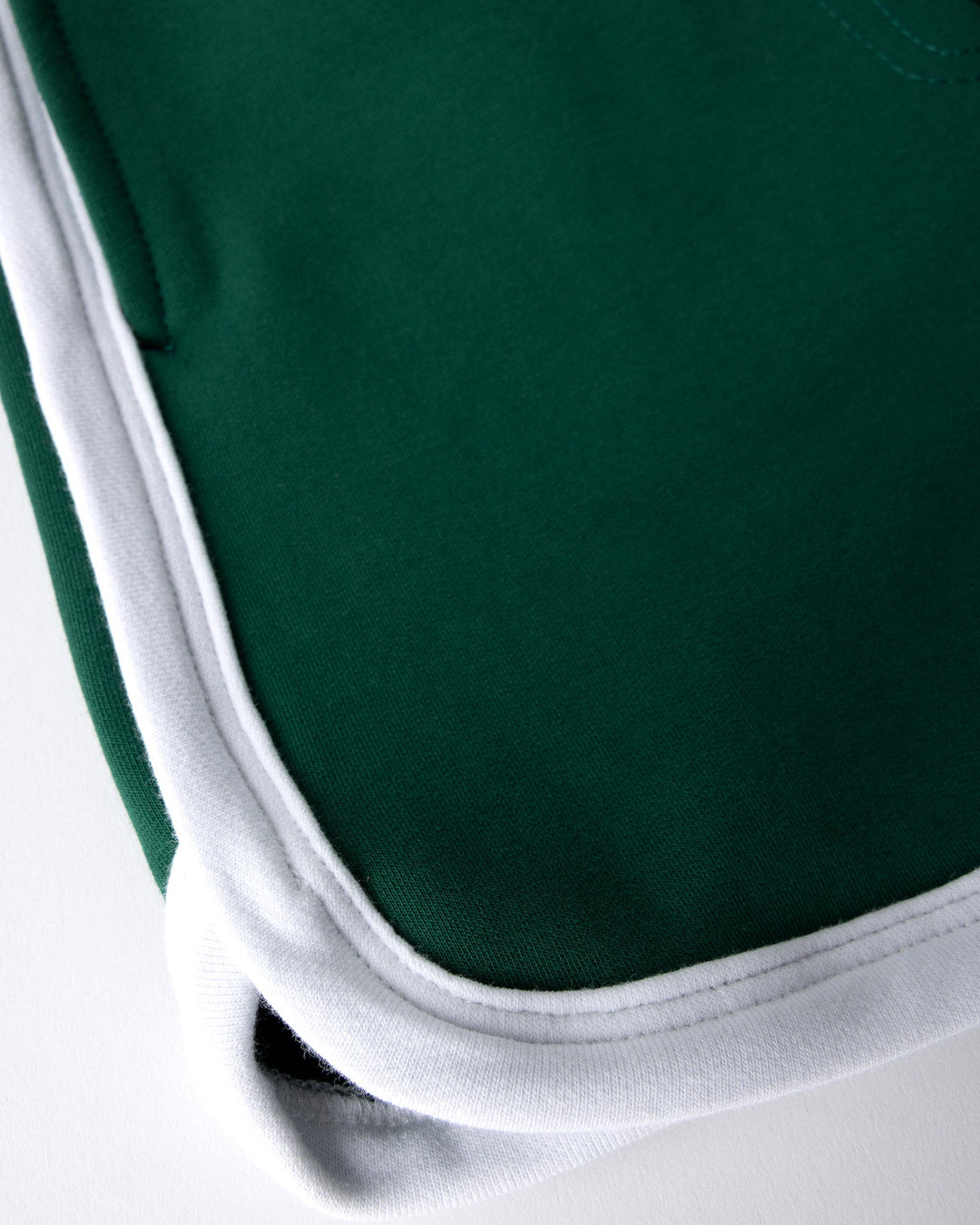 Close up detail of the Sprint Short in kelly green and white