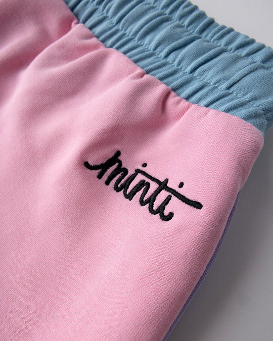 Close up detail of the Sprint Short in pink, purple and aqua