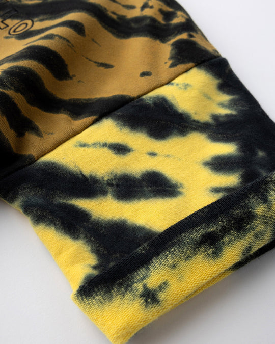 Close up detail of the Duo Tie Dye Short Sleeve Crew in lemon and rust