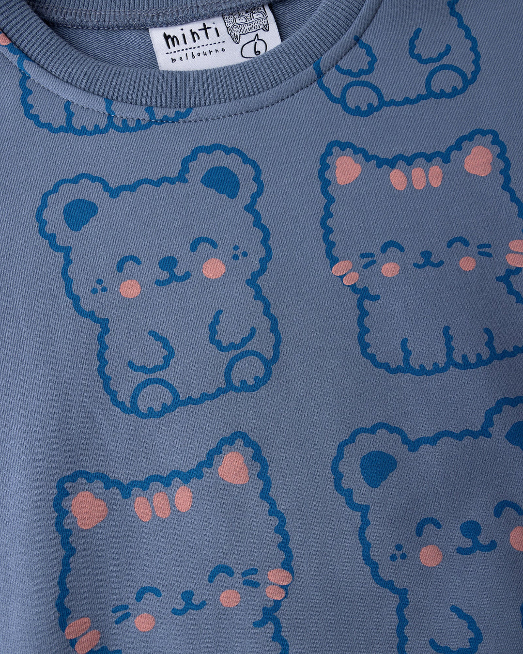 Close up of the Hi Cat Bear Short Sleeve Crew print in cornflower and pink