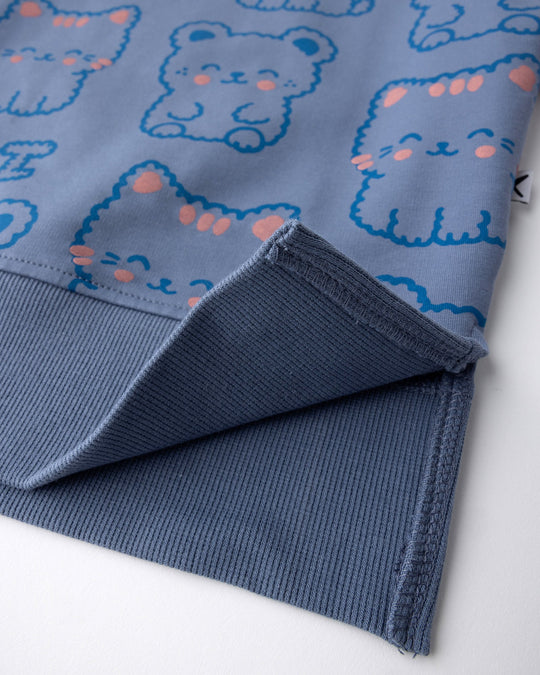 Close up detail of the Hi Cat Bear Short Sleeve Crew in cornflower and pink