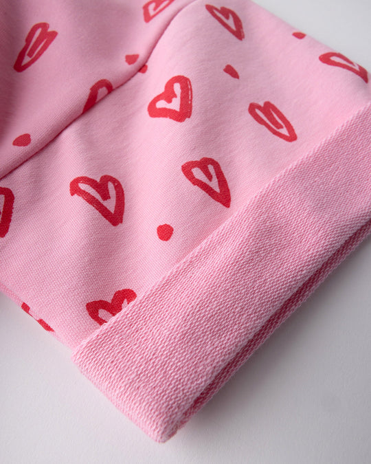 Close up of the Hearts Short Sleeve Crew print in pink