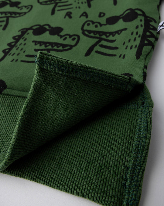 Close up detail of the Rad Croc Short Sleeve Crew in green