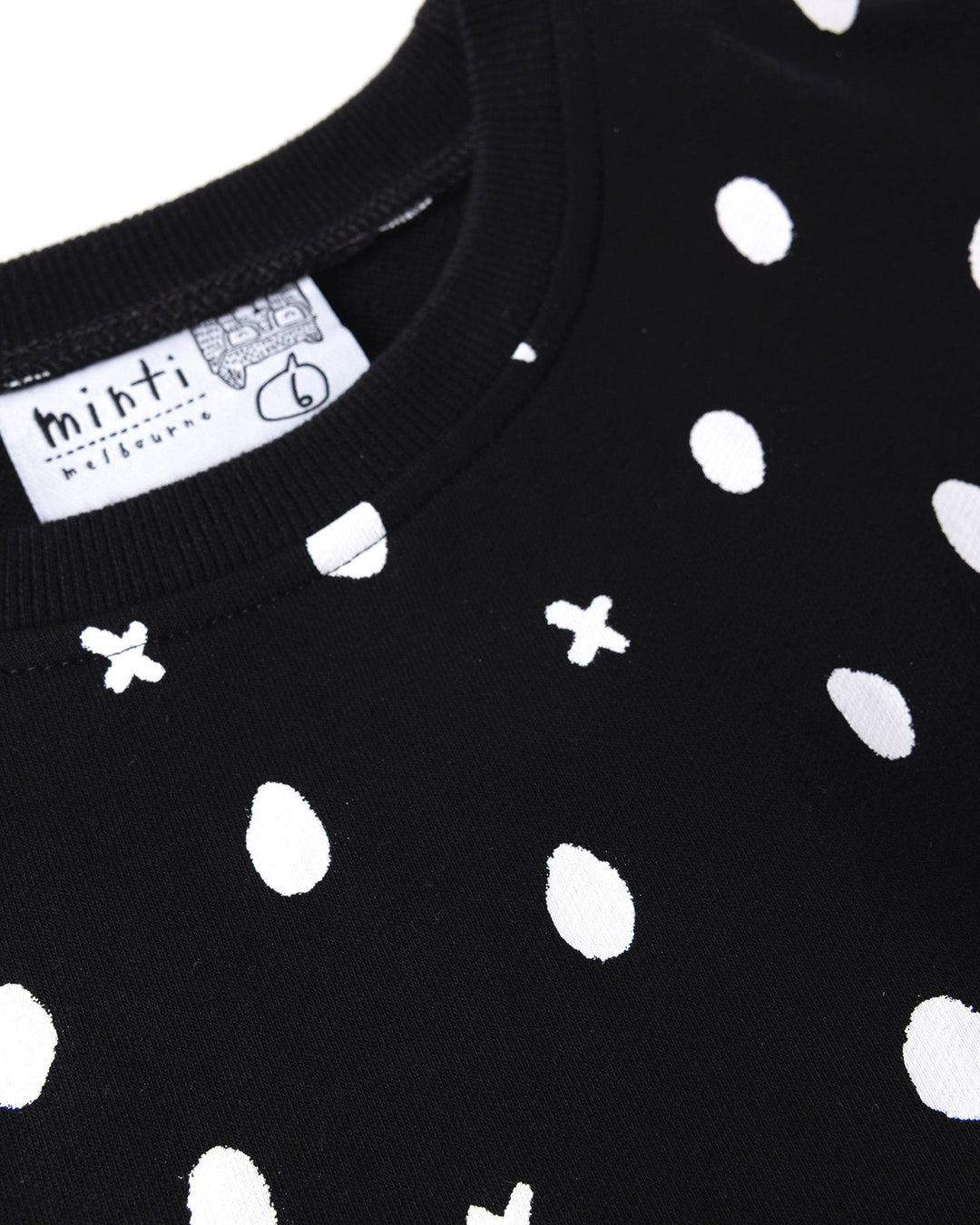 Close up detail of the Spotty Short Sleeve Crew in black