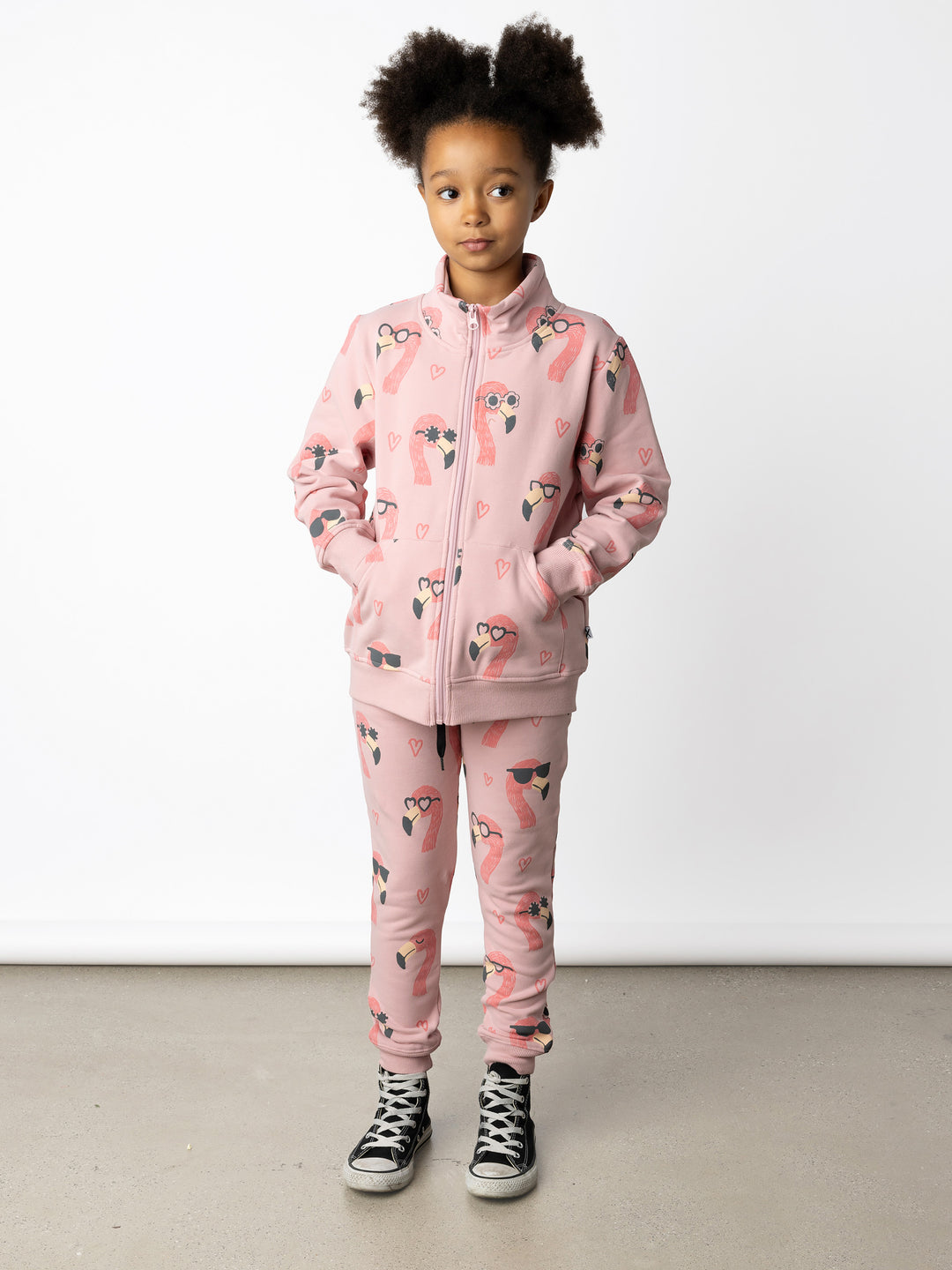 Minti kids clothing. Super cosy and soft zip up high neck crew with 2x2 Rib cuffs and hem. Front kangaroo pocket to keep hands warm. 330 Gram // Brushed Inside // 95% Cotton // 5% Elastane.