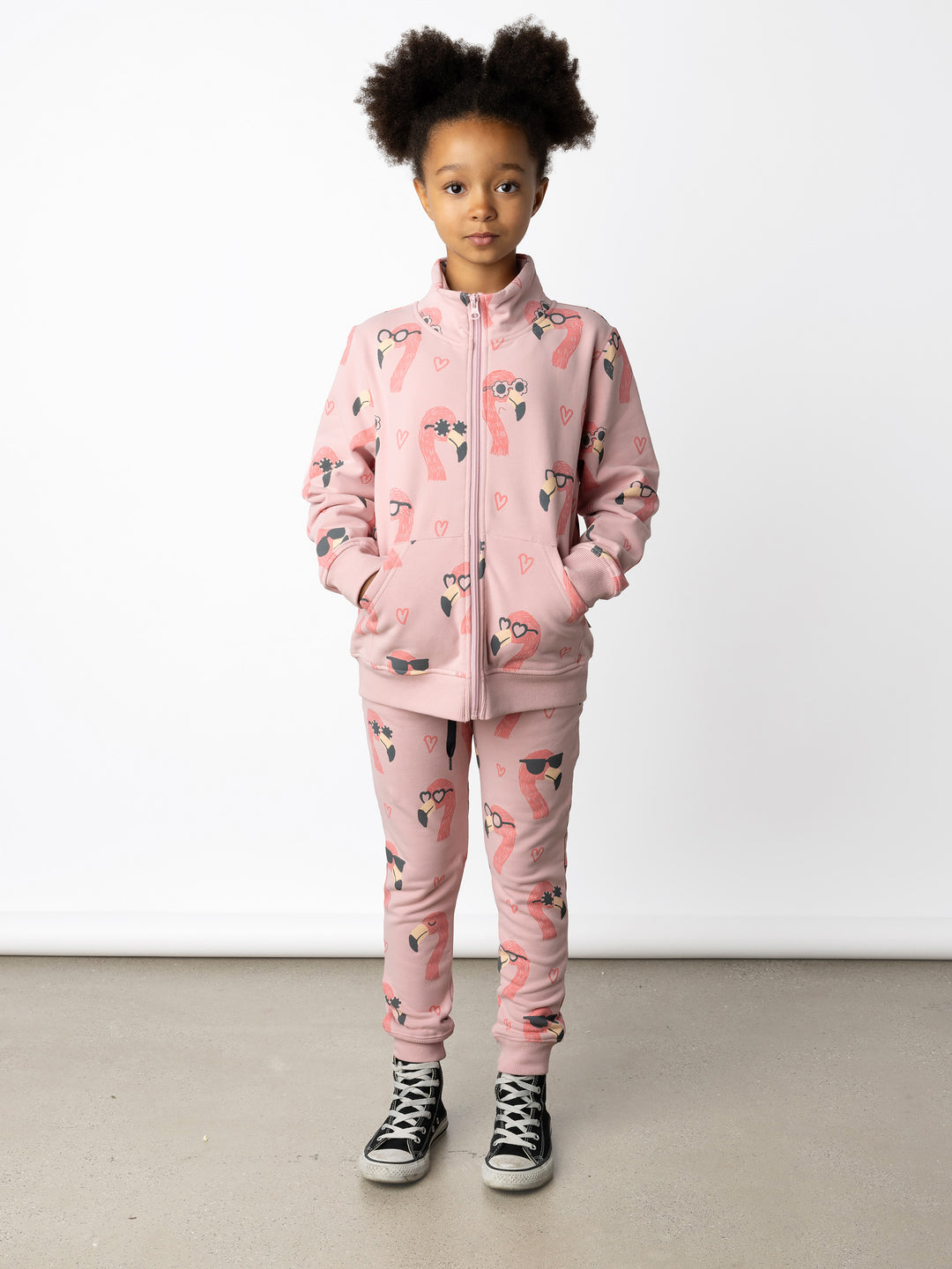 Minti kids clothing. Super cosy and soft zip up high neck crew with 2x2 Rib cuffs and hem. Front kangaroo pocket to keep hands warm. 330 Gram // Brushed Inside // 95% Cotton // 5% Elastane.