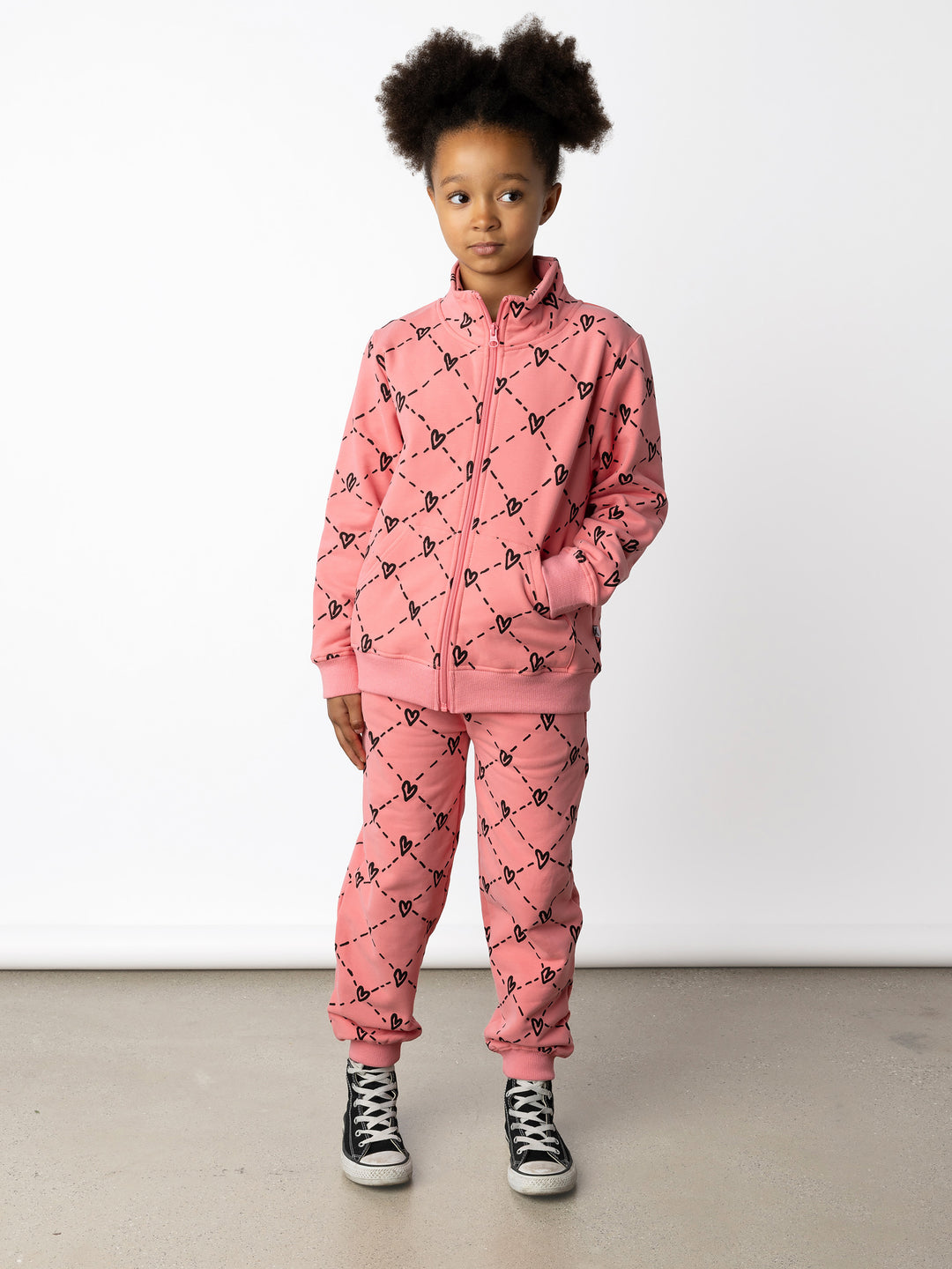 Minti kids clothing. Super cosy and soft zip up high neck crew with 2x2 Rib cuffs and hem. Front kangaroo pocket to keep hands warm. 330 Gram // Brushed Inside // 95% Cotton // 5% Elastane.