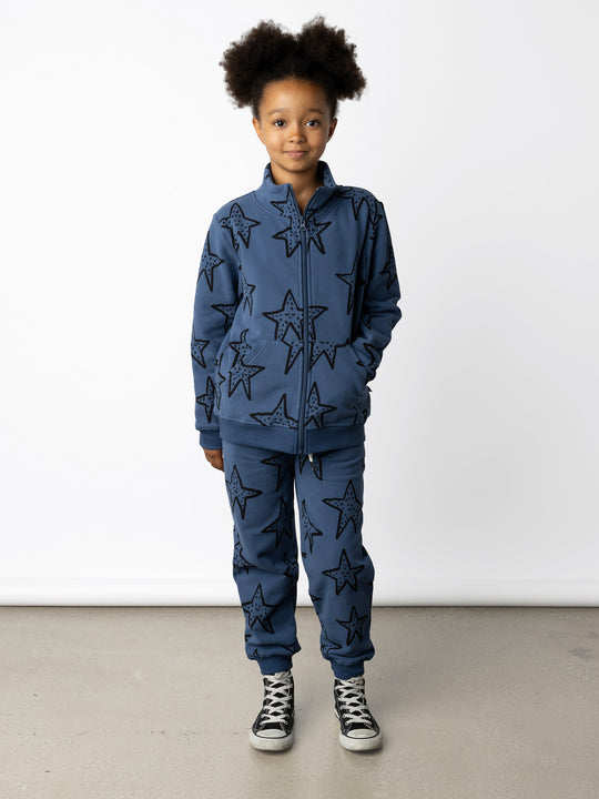 Minti kids clothing. Super cosy and soft zip up high neck crew with 2x2 Rib cuffs and hem. Front kangaroo pocket to keep hands warm. 330 Gram // Brushed Inside // 95% Cotton // 5% Elastane.