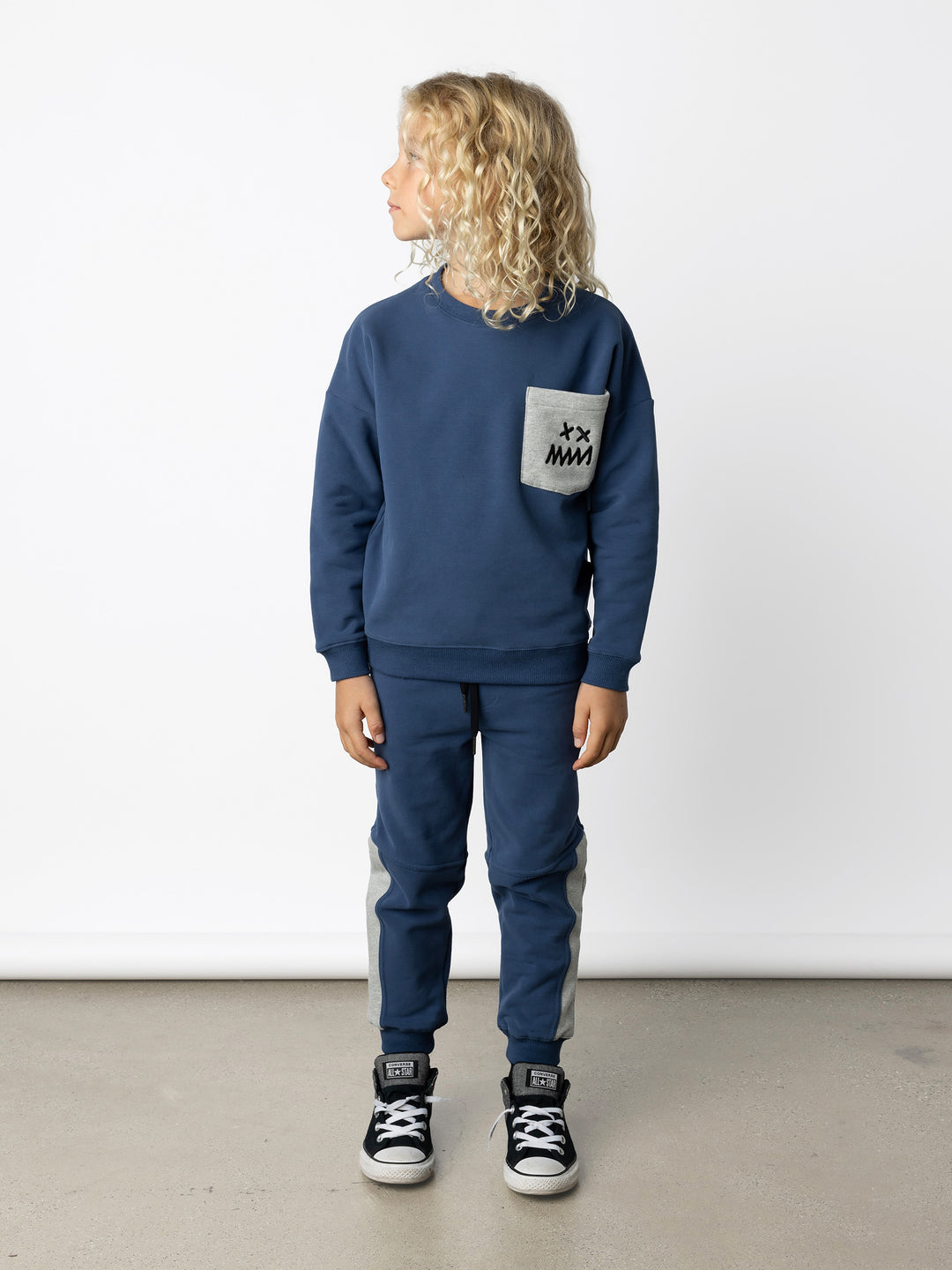 Minti kids clothing. Super cosy oversized fit crew with drop shoulder detail and cool front pocket. 2x2 Rib at the neck, hem and cuffs. 330 Gram // Brushed Inside // 95% Cotton // 5% Elastane.