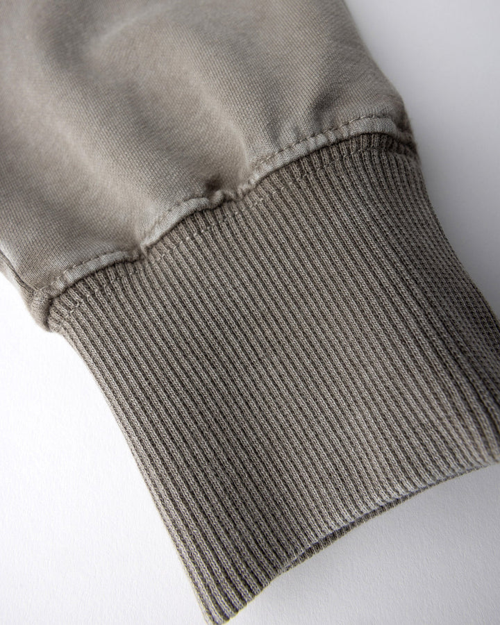 Close up detail of the Blasted Studio Trackies in grey wash