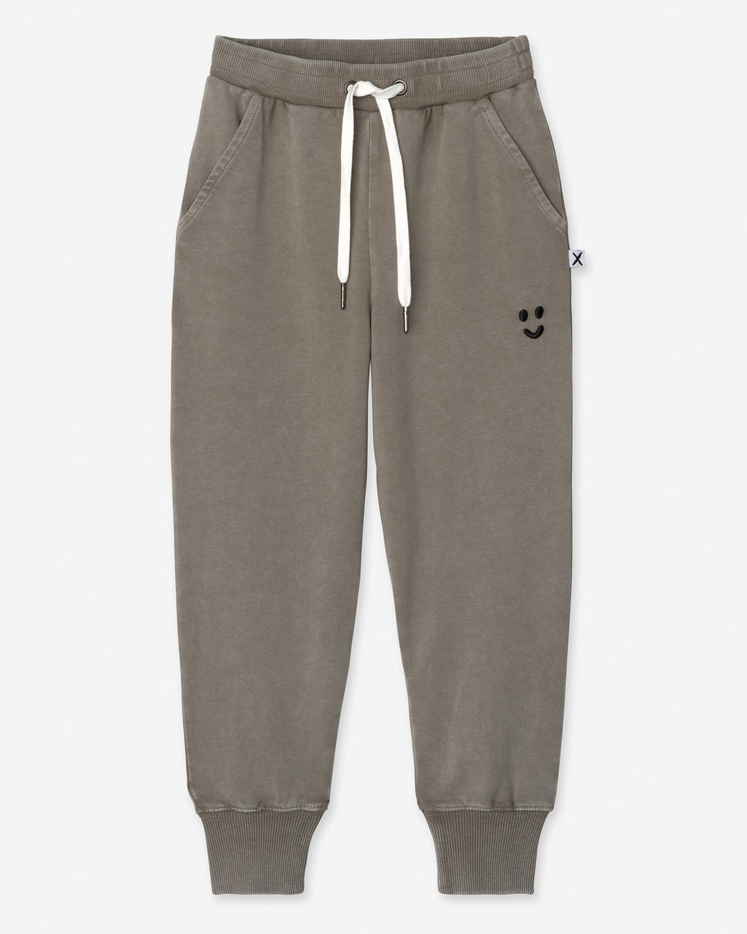 Blasted Studio Trackies in grey wash, boys track pants by Minti, flat lay