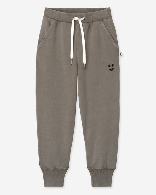 Blasted Studio Trackies in grey wash, boys track pants by Minti, flat lay
