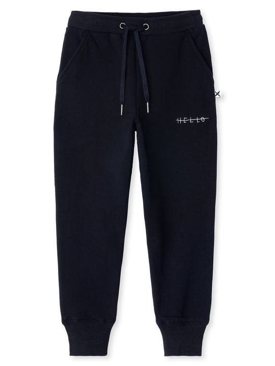 Minti kids clothing. Straight leg trackies with rounded front pockets, elastic waistband, shoelace ties, 2x2 rib cuffs and a small embroidery on the front. 330 Gram // Brushed Inside // 95% Cotton // 5% Elastane.