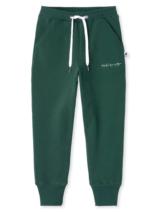 Minti kids clothing. Straight leg trackies with rounded front pockets, elastic waistband, shoelace ties, 2x2 rib cuffs and a small embroidery on the front. 330 Gram // Brushed Inside // 95% Cotton // 5% Elastane.
