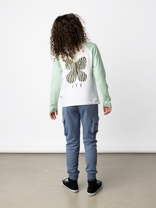 Minti kids clothing. Luxe raglan tee with contrast sleeves and neck. 190 Gram // 95% Cotton // 5% Elastane.