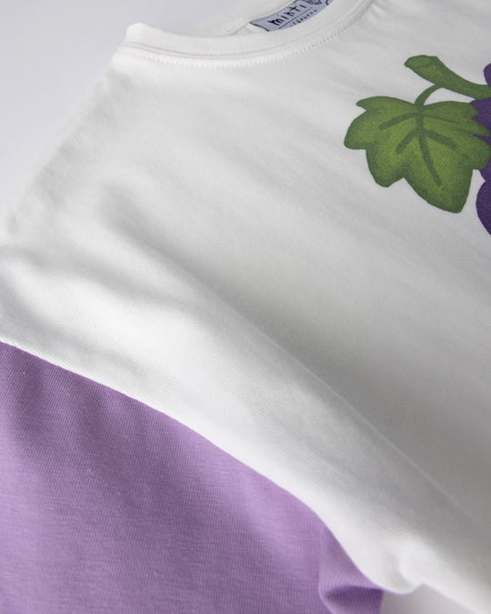 Close up detail of the Biking Grape Tee in white, purple and green