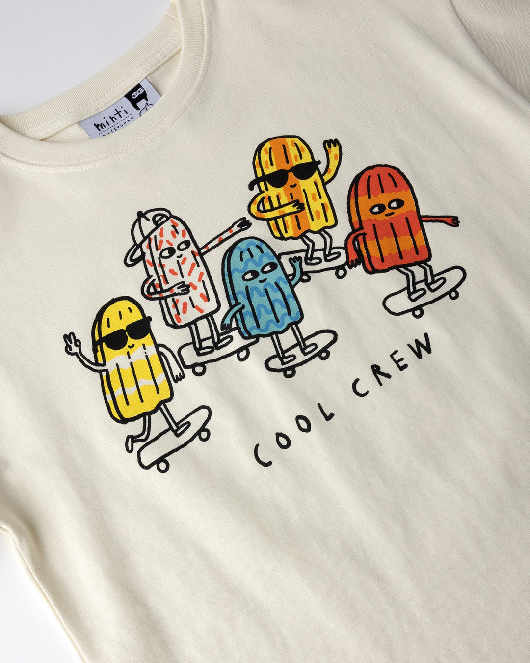 Close up of the Cool Crew Tee print in cream