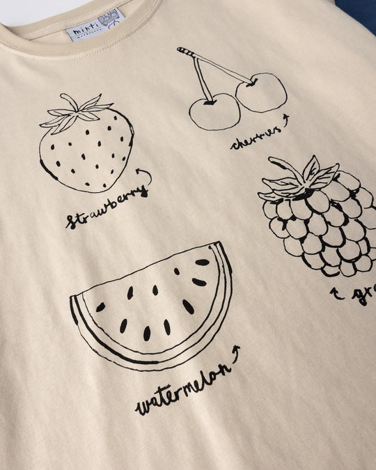 Close up of the Different Fruits Tee print in stone and midnight