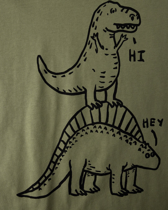 Close up of the Dino Ride Tee print in light khaki