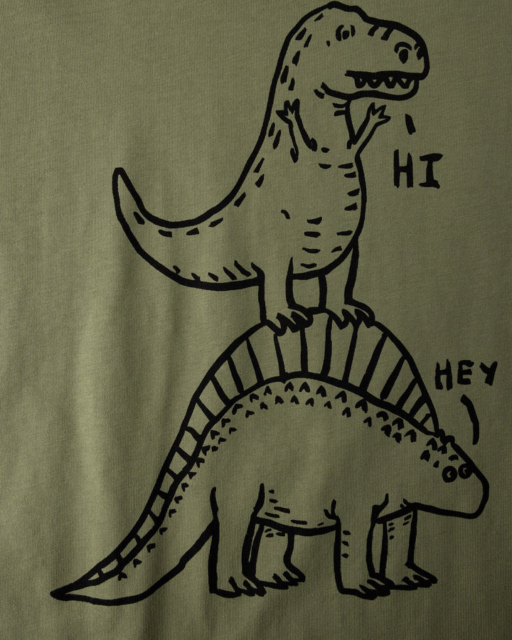Close up of the Dino Ride Tee print in light khaki