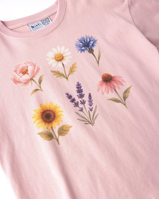 Close up of the Flower Friends Tee print in muted pink