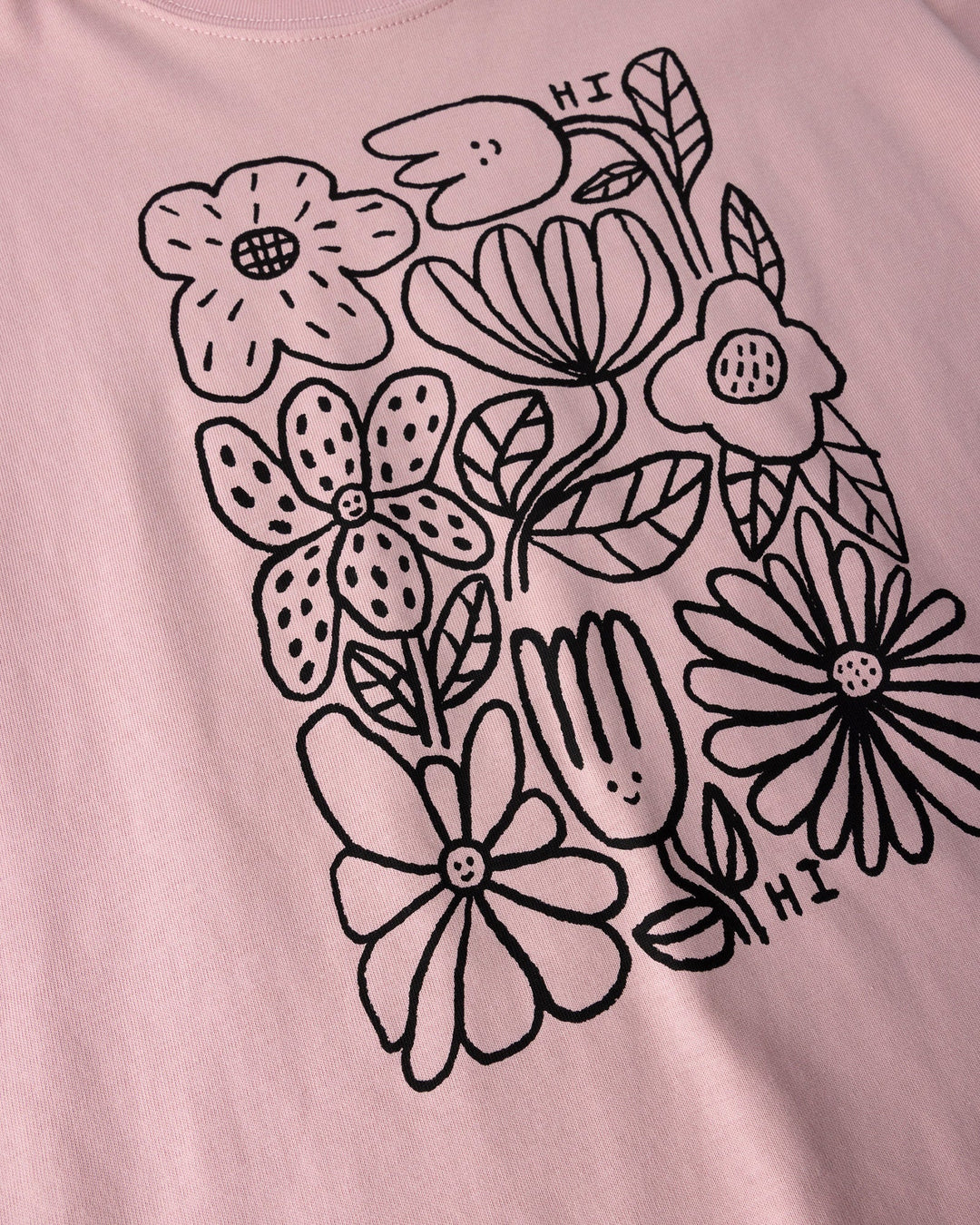 Close up of the Flower Party Tee print in muted pink